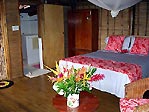 Inside the bure with fresh flowers, Kadavu, Fiji