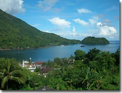 Banda Harbour with the 'Archipelago' moored in the distance,Indonesia